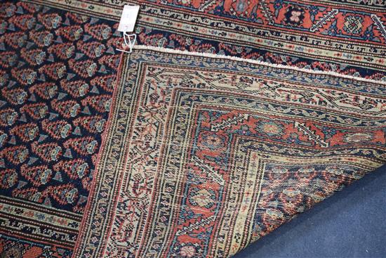 A Saraband blue ground rug, 6ft 2in by 3ft 7in.